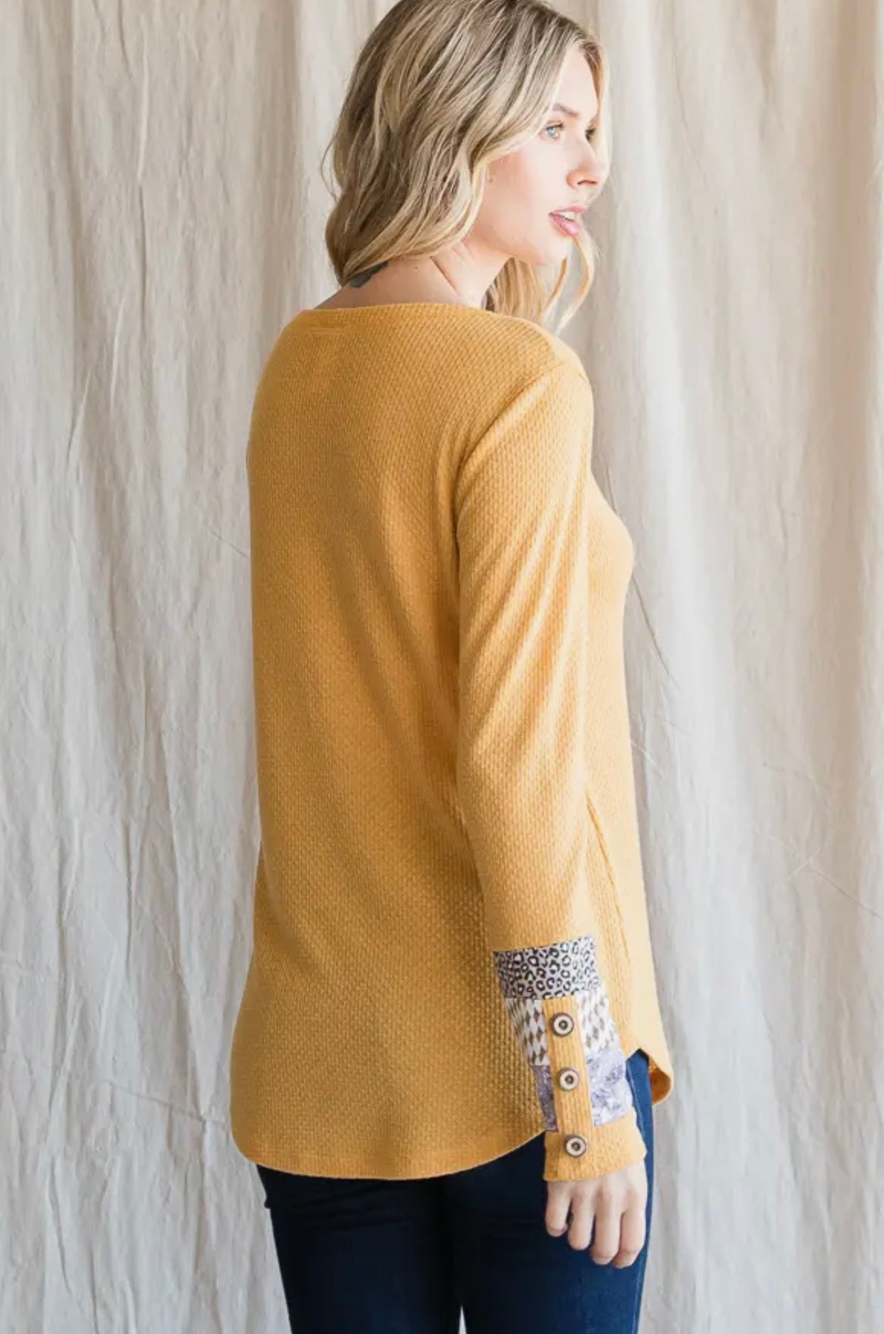 Waffle knit top with button accent