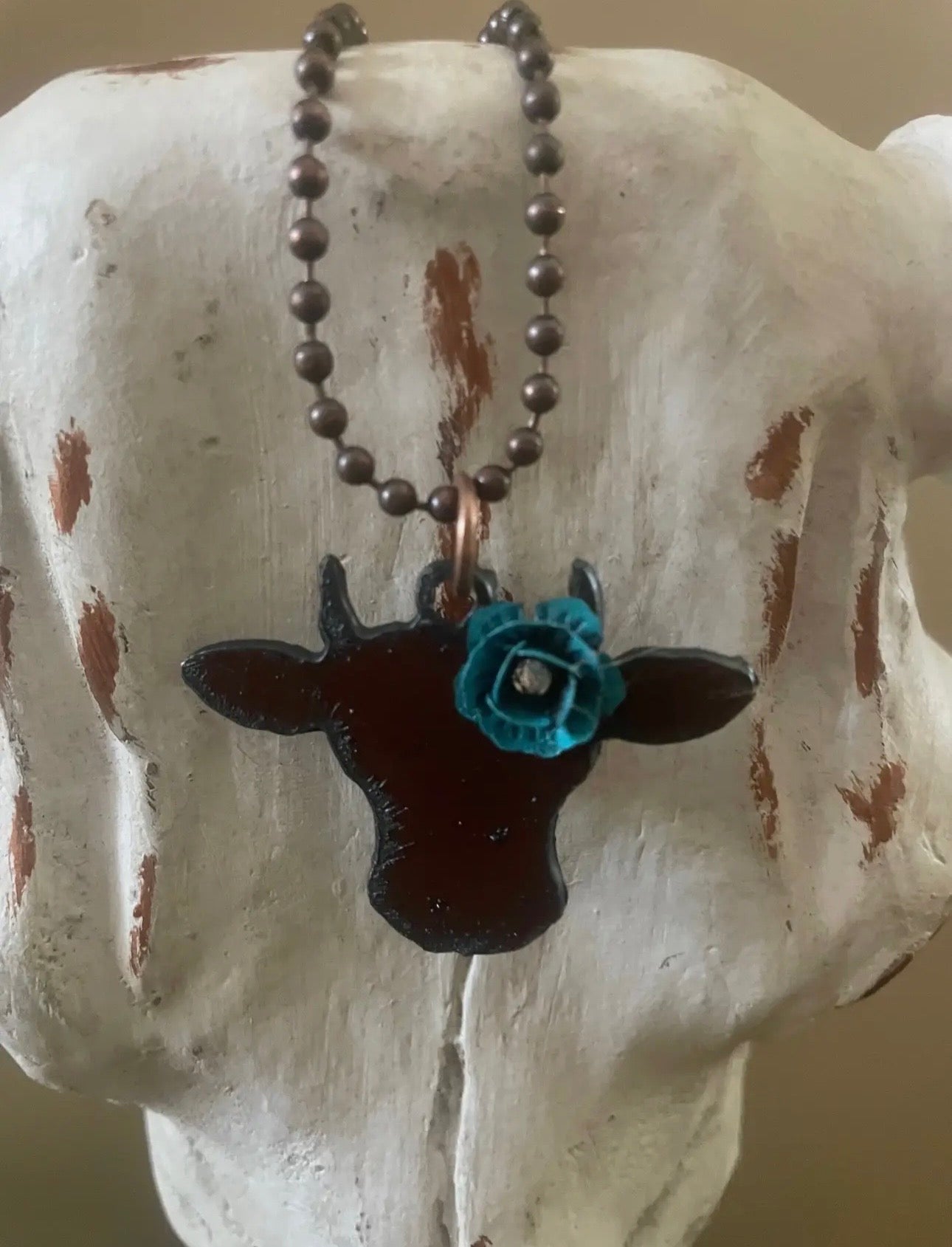Cow head necklace